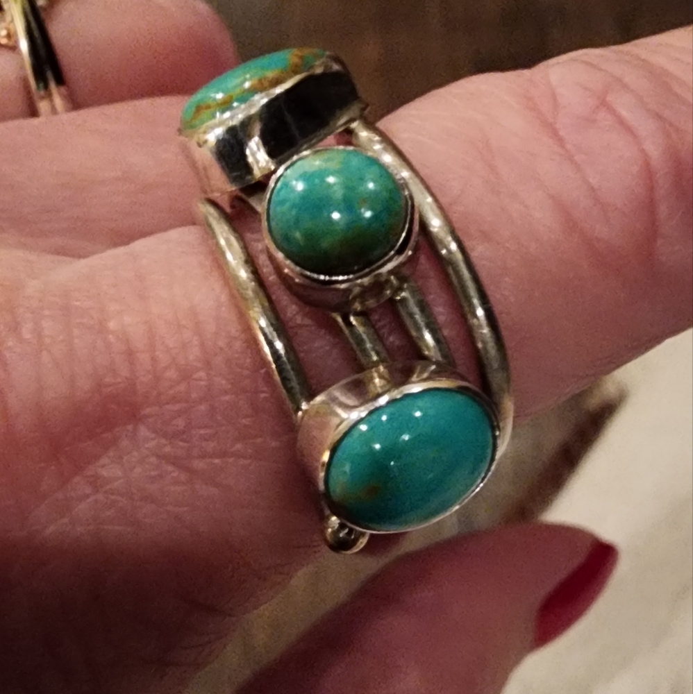 Turquoise ring.